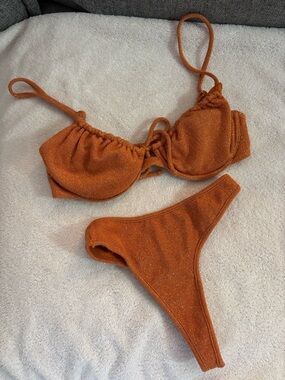Montce Swimwear: Rust Orange Terra Sparkle bibini set with skirt
